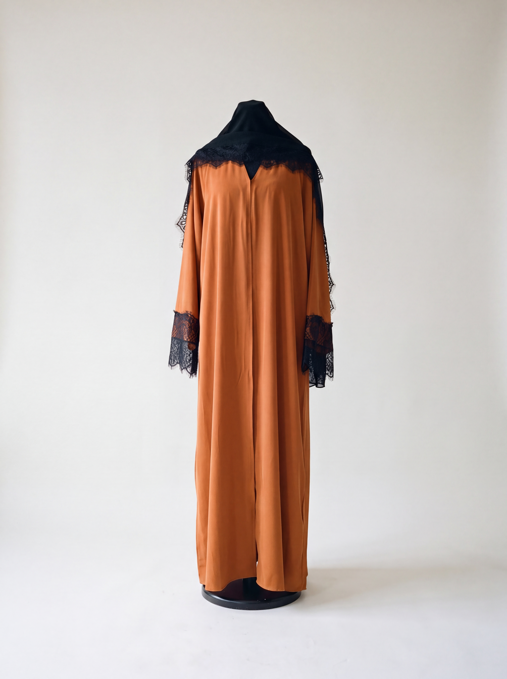 Layali Abaya - Burnt Orange black lace front view with matching hijab