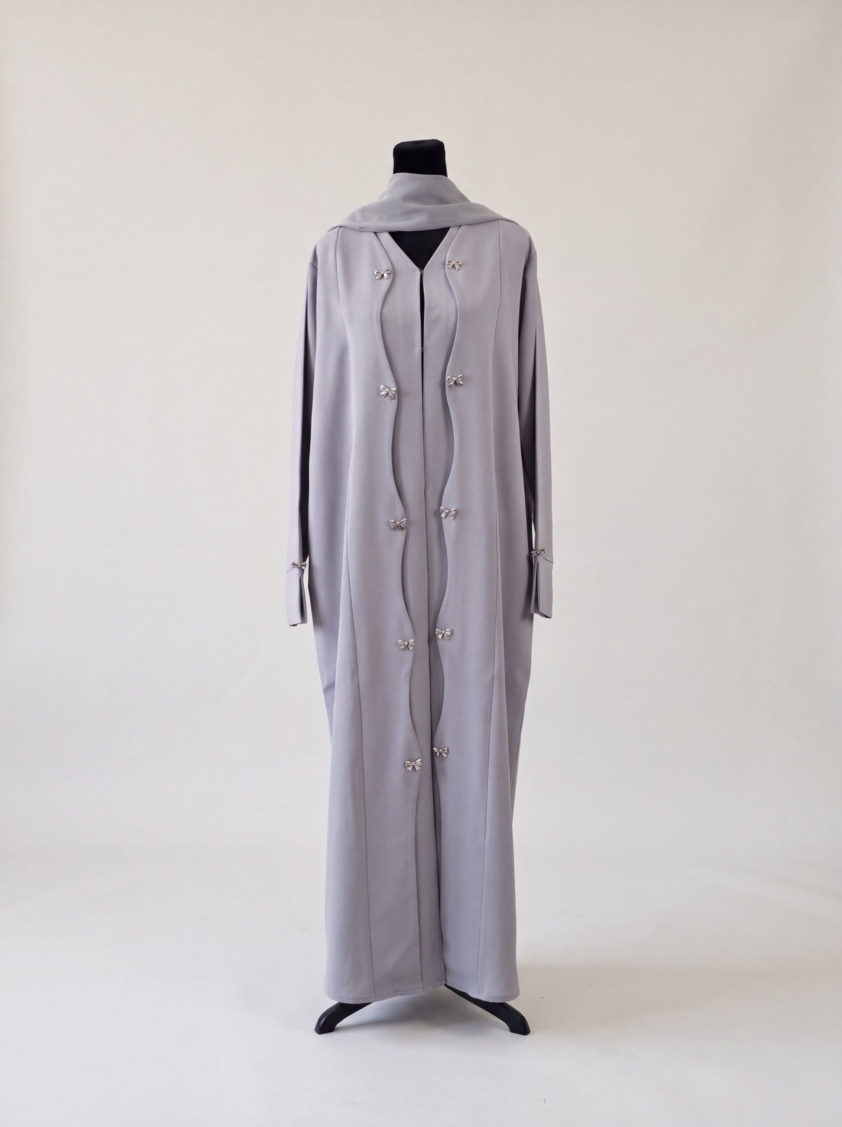 Raneem Abaya - Light Gray front view with bow clasp details