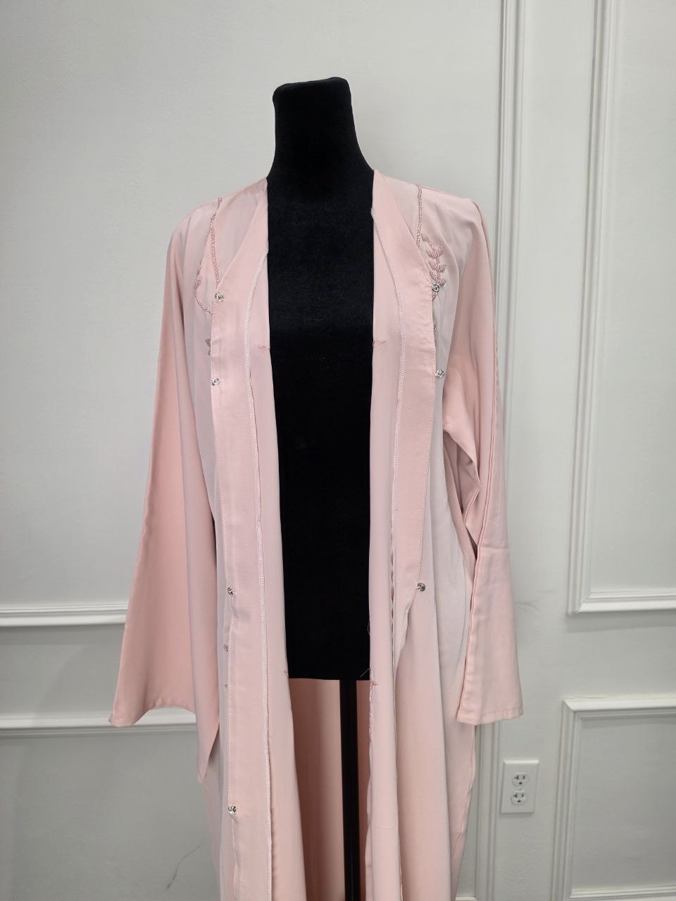 Balqees Abaya - Soft Blush open front detail with pearl buttons and embroidery
