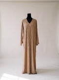 Dahab Abaya - close-up of gold glitter crystal front embellishment