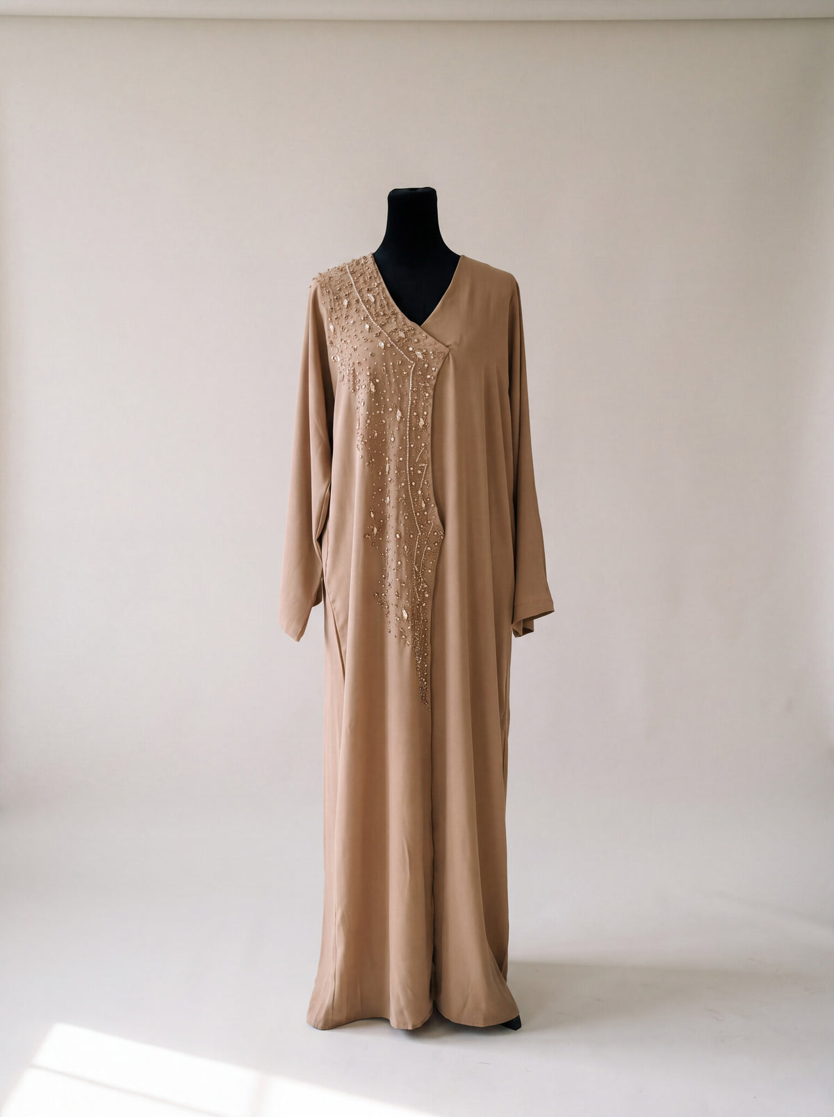 Dahab Abaya - close-up of gold glitter crystal front embellishment