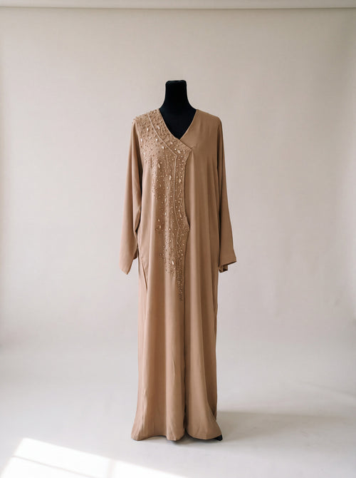 Dahab Abaya - close-up of gold glitter crystal front embellishment