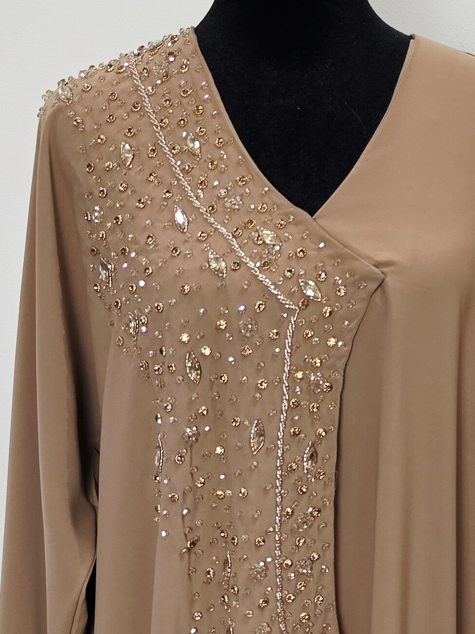 Dahab Abaya - close-up of gold glitter crystal front embellishment