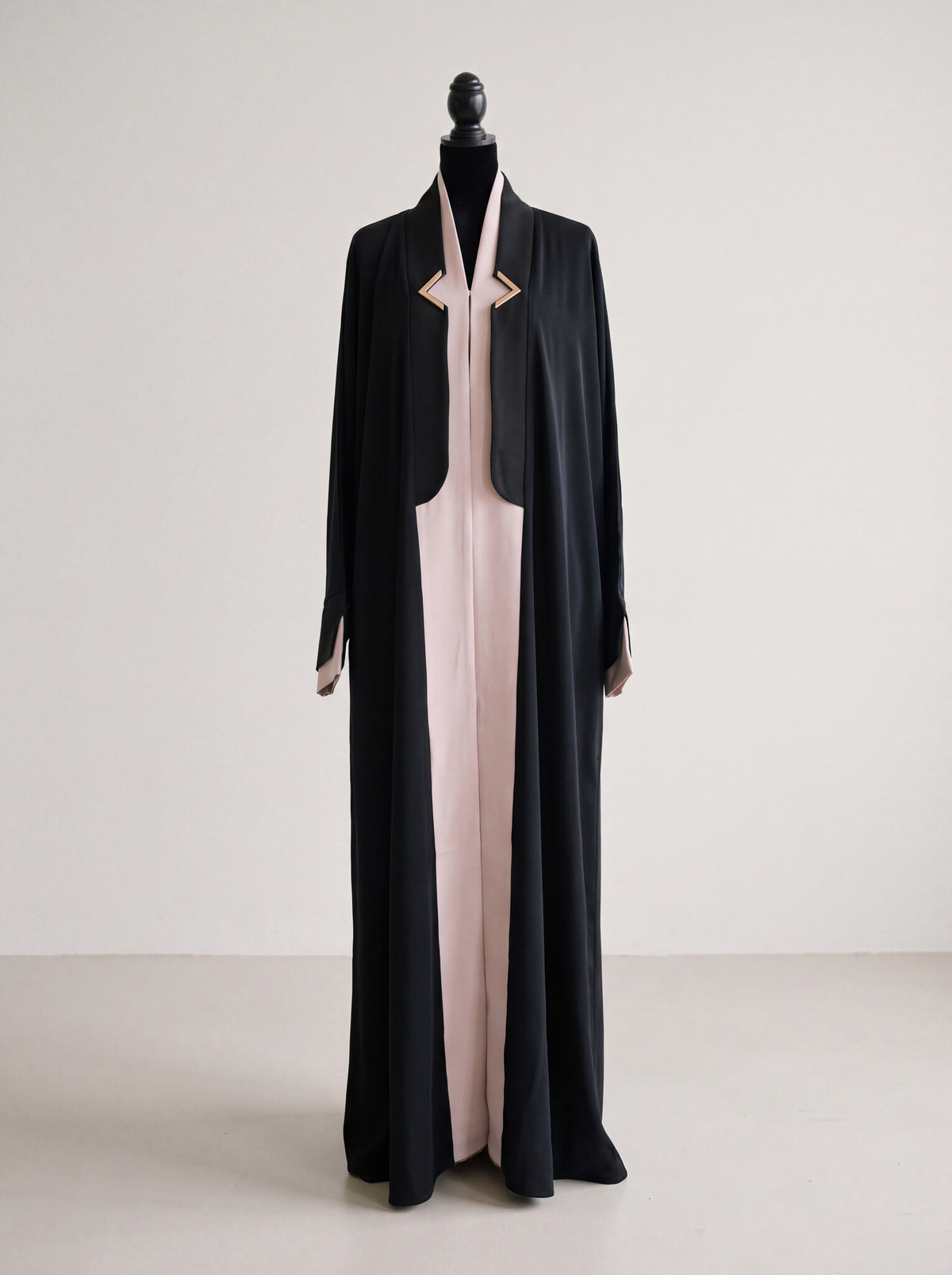 Maysoon Abaya - Black and beige front view with gold-tone clasp details